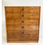 CHEST, 1970's yewwood, with five drawers and recessed brass handles, in the manner of Heals of