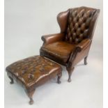 WING ARMCHAIR, early Georgian style buttoned tan leather with matching footstool, chair 81cm W,