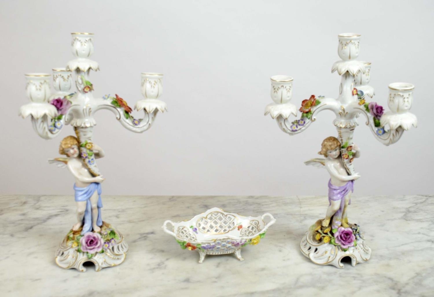 DRESDEN CANDELABRA, a pair, cherub hand painted by Von Schierholz with a similar Dresden pierced