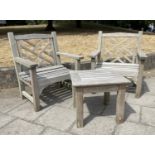 'LISTER' GARDEN ARMCHAIRS, a pair, weathered teak each with lattice back and flat top arms