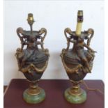 URNS, a pair, late 19th century French spelter, each with a figure of a lady and swag decoration