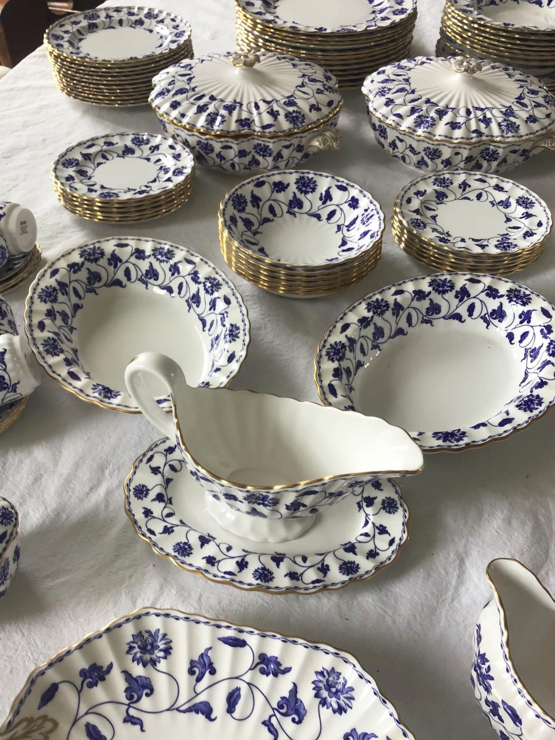 DINNER SERVICE, English fine bone china Spode 'Blue Colonel', twelve place, six piece settings,