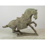 ARCHAIC CHINESE HORSE, patinated metal, 45cm L x 31cm H.