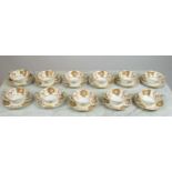ROYAL CROWN DERBY SOUP BOWLS AND DISHES, 'Red Derby Panel', a set of eleven. (11)