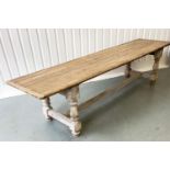 HARVEST TABLE, traditional English planked and cleated on substantial turned stretchered supports,