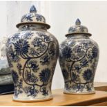 TEMPLES JARS, a pair, Chinese export style, blue and white ceramic, chrysanthemum decoration, 49cm