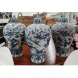 PLUM VASES WITH COVERS, a set of three Chinese export style, blue and white, 48cm H. (3)