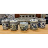 JARS WITH COVERS, a set of four, Chinese export style, blue and white ceramic, and one other, 18cm