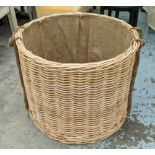 LOG BASKET, wicker, with rope handles.