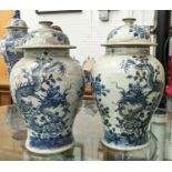 BALUSTER VASES WITH COVERS, a pair, Chinese export style blue and white, dragon decoration, 38cm