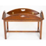 BUTLERS TRAY TABLE, Georgian style mahogany of oval form with hinged sides on stand, 51cm H x