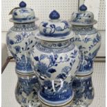 TEMPLE JARS, a set of three, 41cm H, Chinese export style blue and white ceramic, with blossom