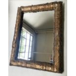 WALL MIRROR, rectangular bevelled mirror and metal gilt leaf frame, 125cm H x 95cm.