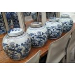 GINGER JARS, a set of four, 24cm H, Chinese Export style blue and white ceramic, with peacock