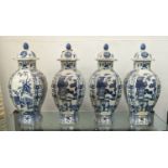 VASES WITH COVERS, a set of four, 48cm H, Chinese Export style blue and white ceramic with scenic