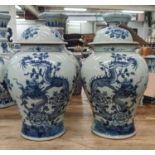 TEMPLE JARS, a pair, 38cm H, Chinese Export style blue and white ceramic, with dragon decoration. (