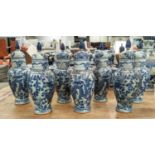 VASES WITH COVERS, a set of seven, 36cm H, Chinese Export style blue and white ceramic, with