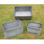 ZINC EFFECT METAL PLANTERS, set of three, graduated, ribbed bodies, largest measuring 33cm H x