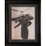 20th/21st CENTURY SCHOOL, 'Woman with Sikorsky Helicopter', photo-print, 69cm x 48cm.