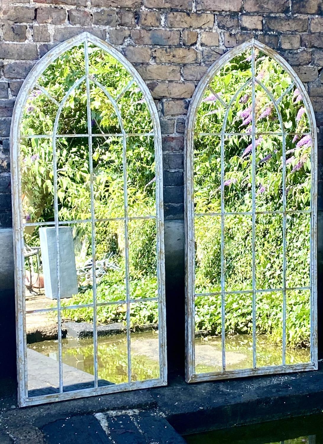 ARCHITECTURAL GARDEN MIRRORS, pair, 158cm H x 66cm W, Gothic arched metal frames, (2)