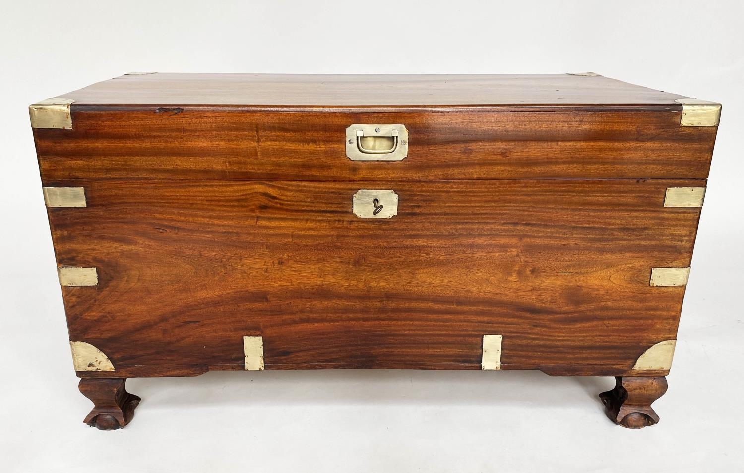 TRUNK, 19th century camphorwood and brass bound with rising lid, carrying handles and short