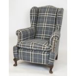 WING ARMCHAIR, 110cm H x 86cm W, early 20th century mahogany, newly upholstered in grey check