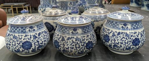 CHINESE JARS AND COVERS, a group of five, 19cm H, blue and white decoration, comprising three of one