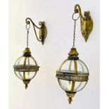 CANDLE LANTERNS, a pair, in the Regency style, 70cm hanging height, of globular form, gilt metal
