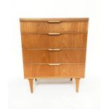 CHEST BY AUSTIN SUITE, 1970s Afromosian with four long drawers and solid teak integral handles, 76cm