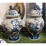 CHINESE TEMPLE VASES AND COVERS, a pair, 37cm H, blue and white decoration, of inverted baluster