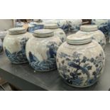 CHINESE GINGER JARS AND COVERS, a set of five, 23cm H x 21cm diam., blue and white decoration, of