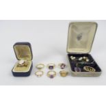 A COLLECTION OF ASSORTED JEWELLERY, comprising two amethyst gold rings, a cultured pearl ring, a