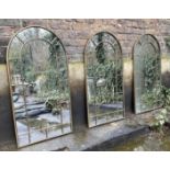 ARCHITECTURAL WALL MIRRORS, a set of three, 107cm x 55cm, bronzed finish frames. (3)