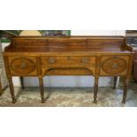 SIDEBOARD, Regency mahogany, circa 1810, with sliding doors above a further door, two middle drawers