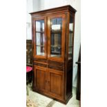 DISPLAY CABINET, fruitwood with four doors and four drawers, 102cm W x 40cm D x 190cm H. (To be sold