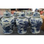 CHINESE TEMPLE JARS AND COVERS, a set of five, 36cm H, blue and white decoration, of inverted