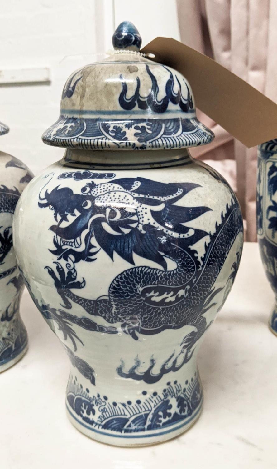 BALUSTER VASES WITH COVERS, a sdet of three, Chinese export style blue and white ceramic, dragon - Image 2 of 3