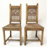 HALL CHAIRS, a pair, 19th century Gothic oak castellated in the 'Strawberry Hill' style with rush