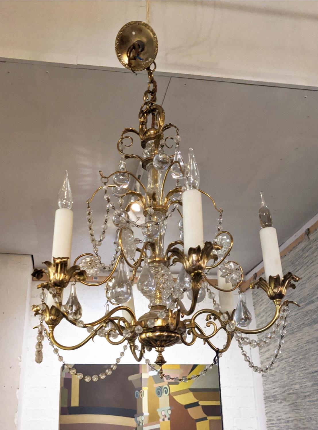 CHANDELIER, 43cm W x 51cm H excluding chain, 20th century, gilt metal and glass, with six lights.