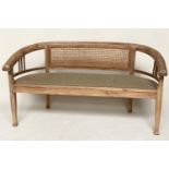 HALL SEAT, colonial style, faded teak of bow outline, cane panelled with brass studded linen
