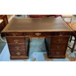PARTNERS DESK, 19th century mahogany with a rectangular gilt tooled leather top above nine drawers