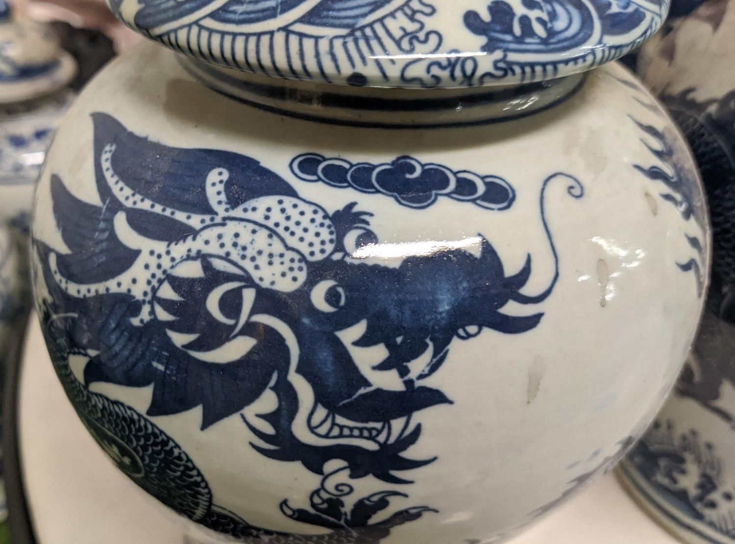 BALUSTER VASES WITH COVERS, a sdet of three, Chinese export style blue and white ceramic, dragon - Image 3 of 3