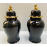 TEMPLE JARS, a pair, black glazed ceramic with gilt accents, 67cm x 32cm.