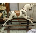ROCKING HORSE, late 19th century, mottled cream painted wood, turned supports, original fixings,