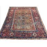 ANTIQUE PERSIAN FEREGHAN RUG, 230cm x 200cm.