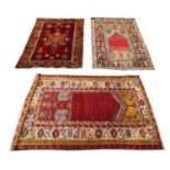 TRIBAL RUGS, three, largest 265cm x 108cm. (3)