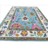 CONTEMPORARY OUSHAK CARPET, 337cm x 247cm.