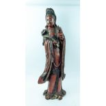 CHINESE CARVED FIGURE OF GUANYIN, Qing dynasty lacquered wood with gilt highlights, 80cm H.