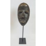 DAN TRIBAL MASK, on stand, 72cm H.