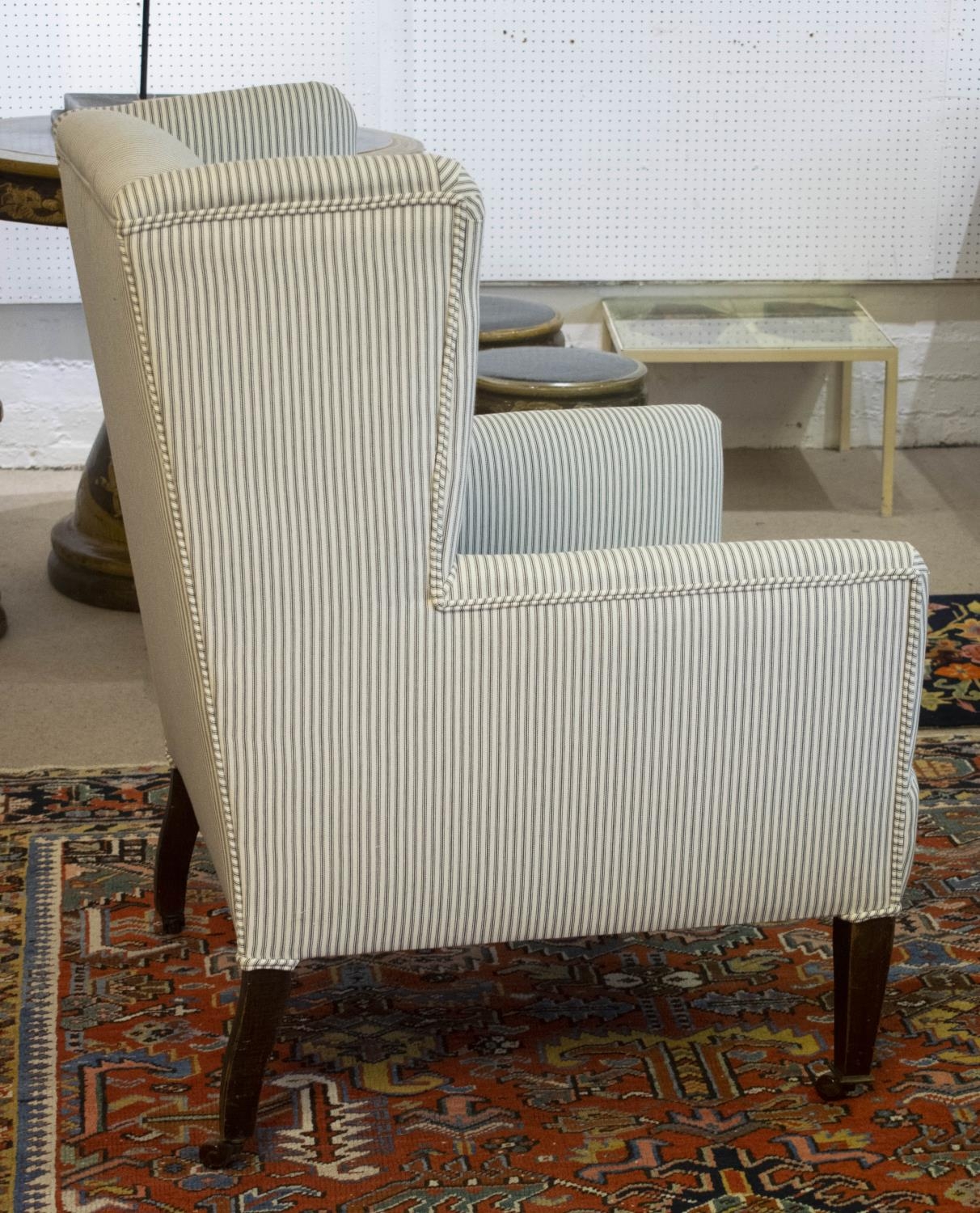 WING ARMCHAIR, 100cm H x 68cm W, Edwardian, newly upholstered in ticking on ceramic castors. - Bild 4 aus 7